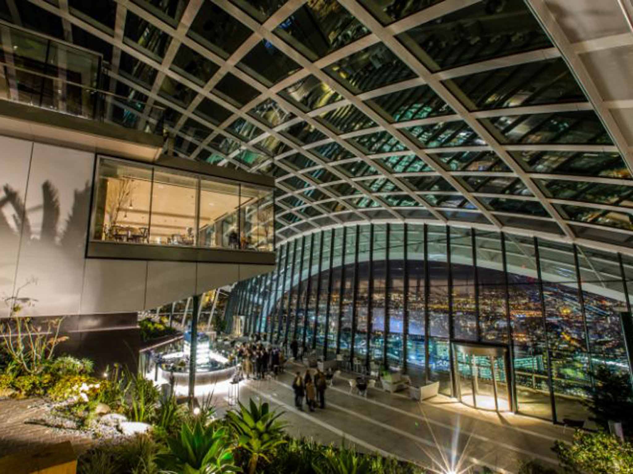 At the top of the 'walkie-talkie' skyscraper in the City of London - officially 20 Fenchurch Street - a Sky Garden gives spectacular capital views