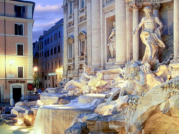 Toss a coin into the Trevi Fountain and to Roma you'll return. REX FEATURES