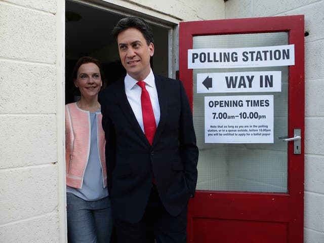 Labour Party leader Ed Miliband and his wife Justine Thornton leave the polling station at Sutton Village Hall in Sutton 