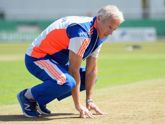 Under pressure England cricket coach Peter Moores inspects the pitch at
Malahide, near Dublin, ahead of today’s one-day international against Ireland