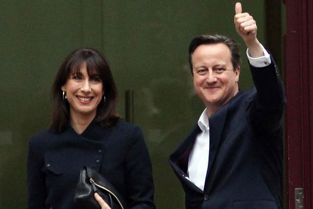 Prime Minister David Cameron and wife Samantha arrive at his Tory headquarters in central London 