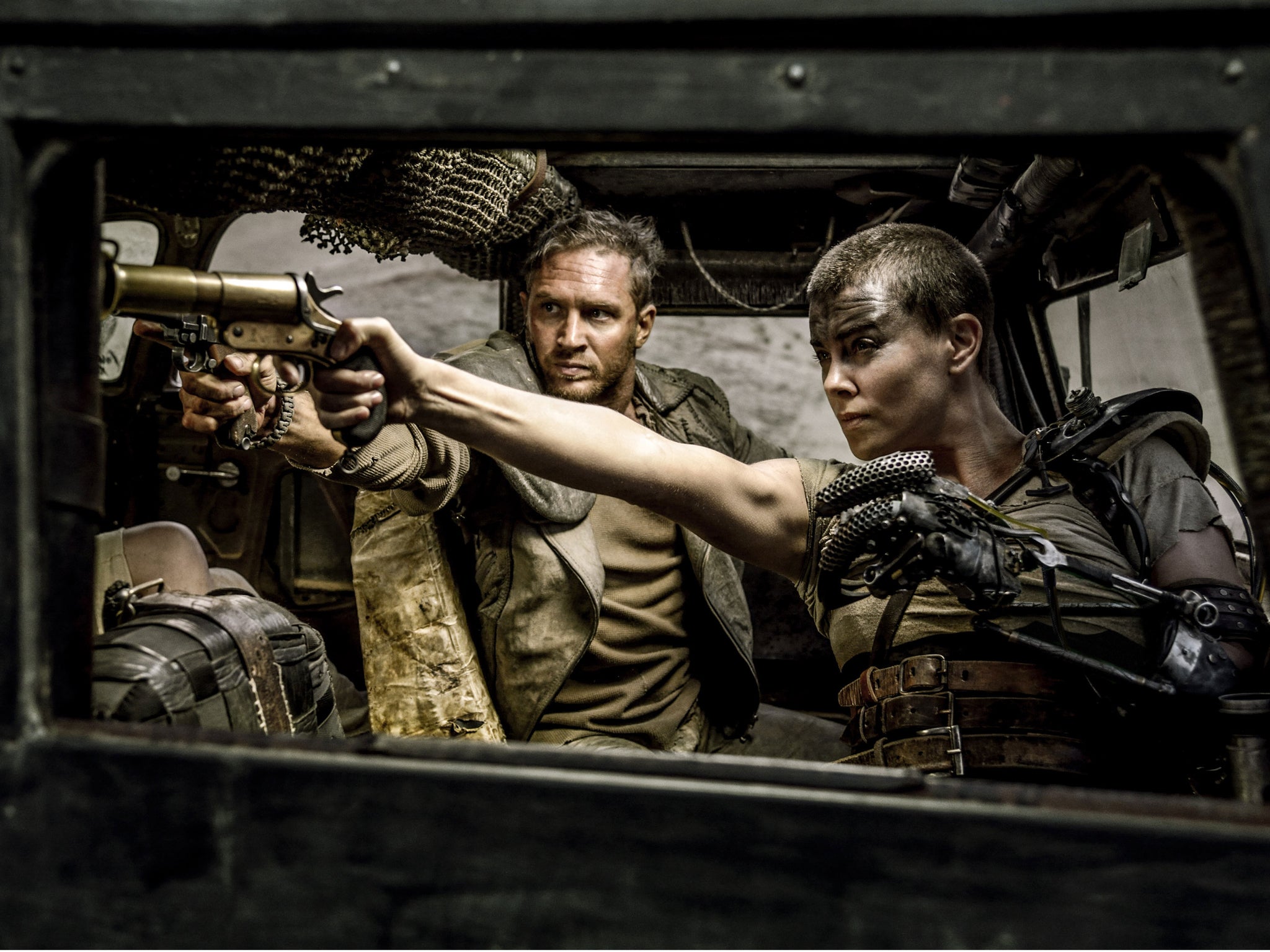 Tom Hardy and Charlize Theron starring in Mad Max: Fury Road