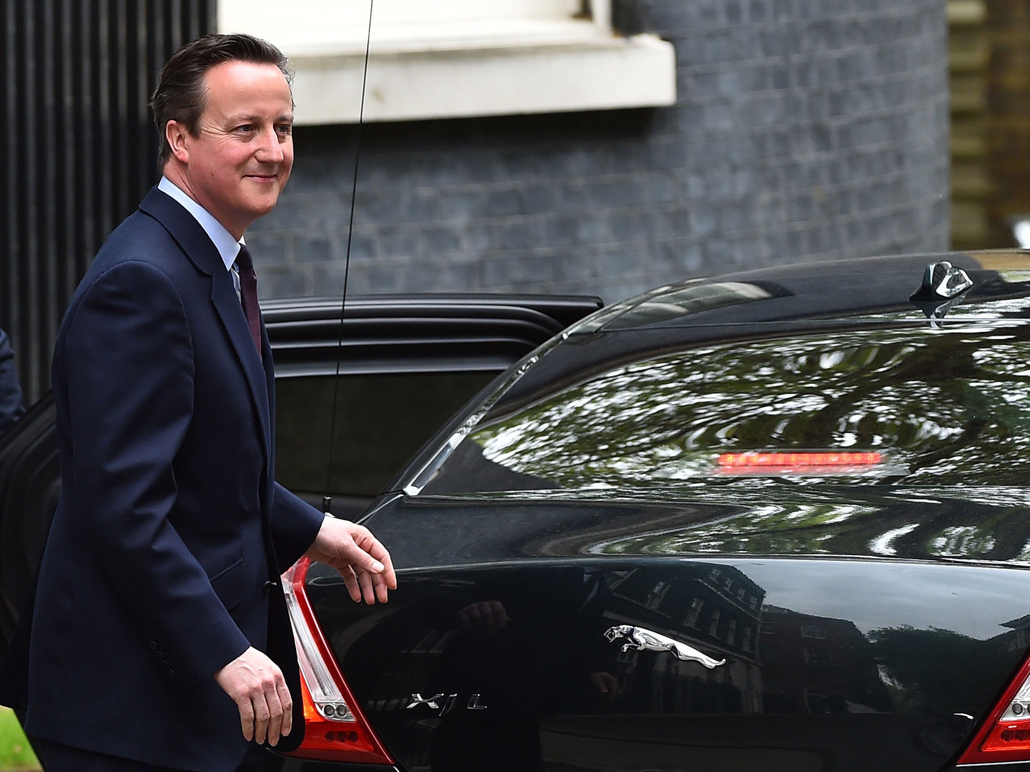 David Cameron celebrates after winning majority