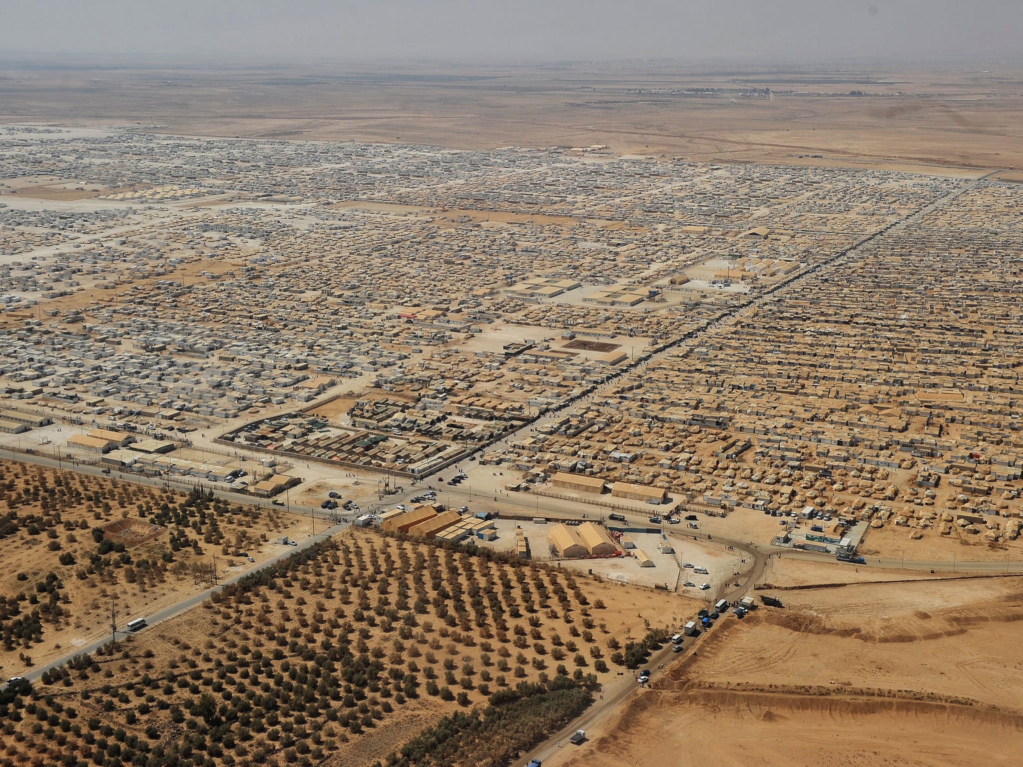 The Zaatari refugee camp near Mafraq, 8km from the Jordanian-Syrian border, is home to more than 80,000 Syrians