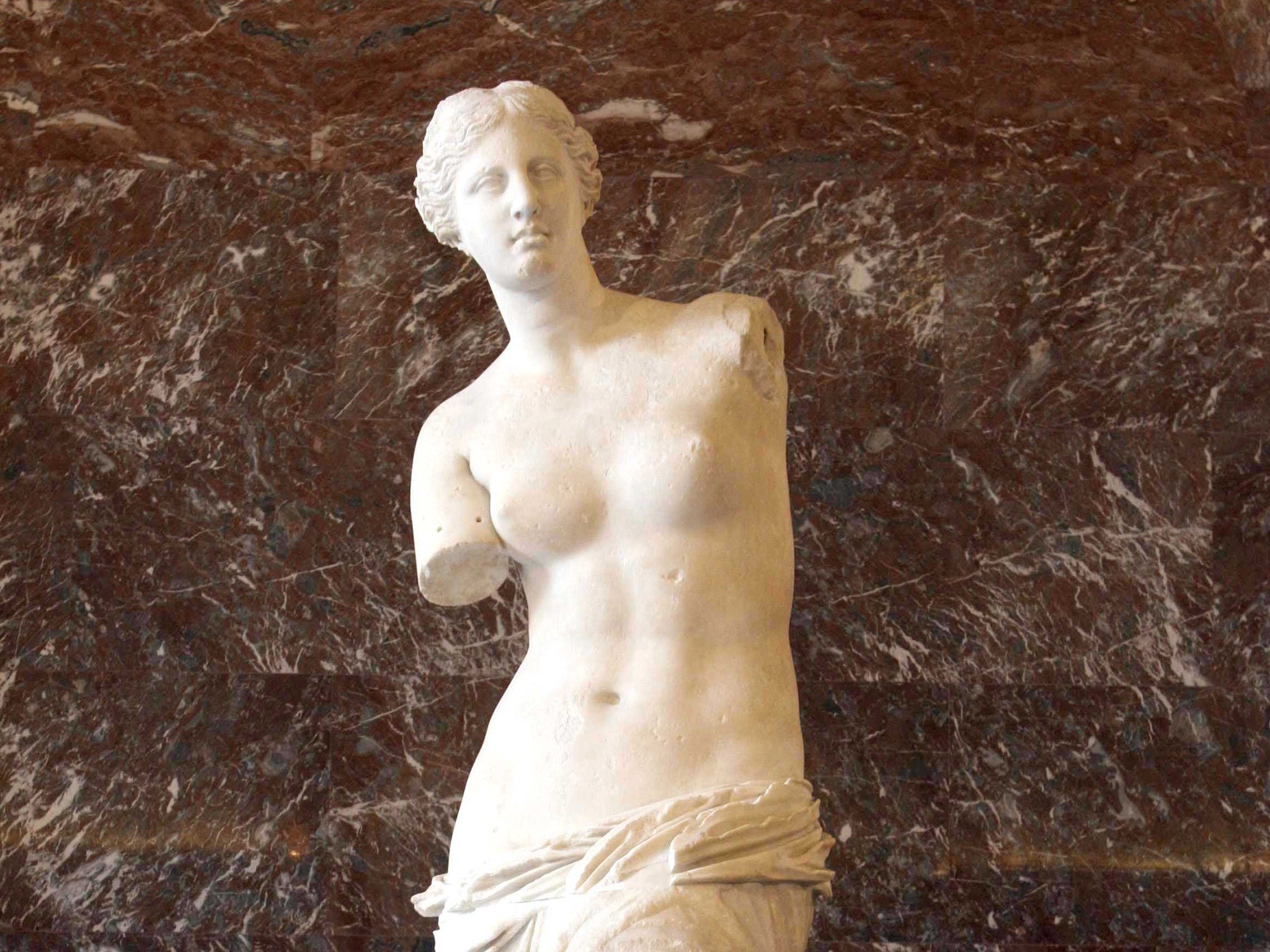 The Venus de Milo, credited to Alexandros of Antiochus, on display in the Louvre