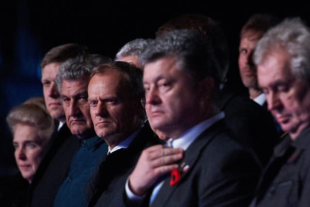 Polish President Donald Tusk (centre) hosts leaders in Warsaw