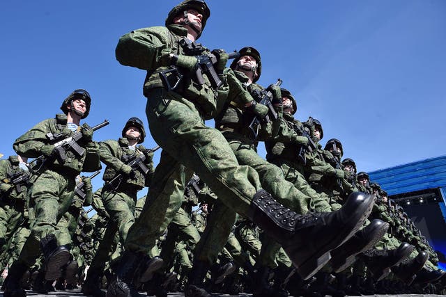 Soldiers march during a rehearsal of the Victory Day parade on Red Square