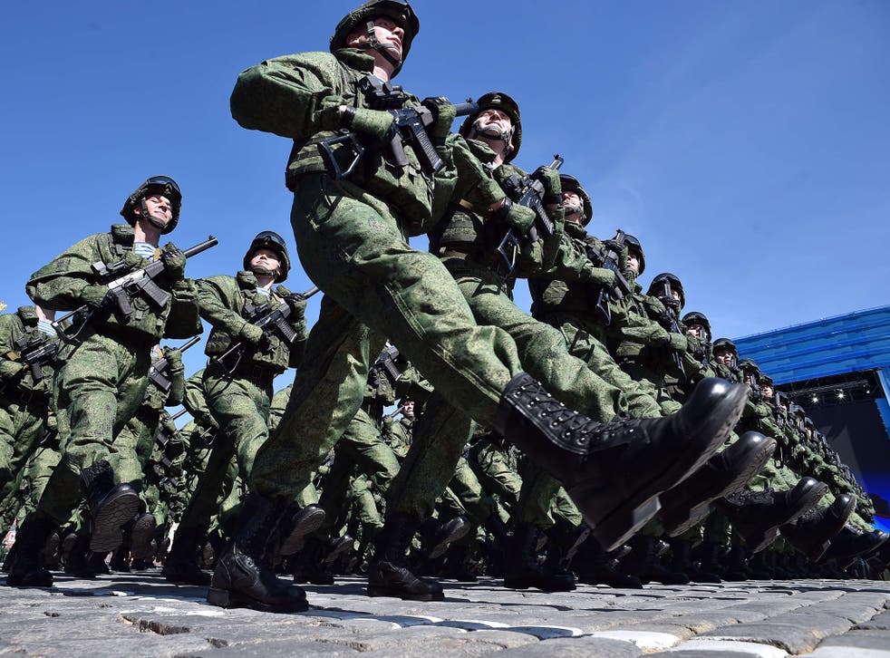 Soldiers march during a rehearsal of the Victory Day parade on Red Square