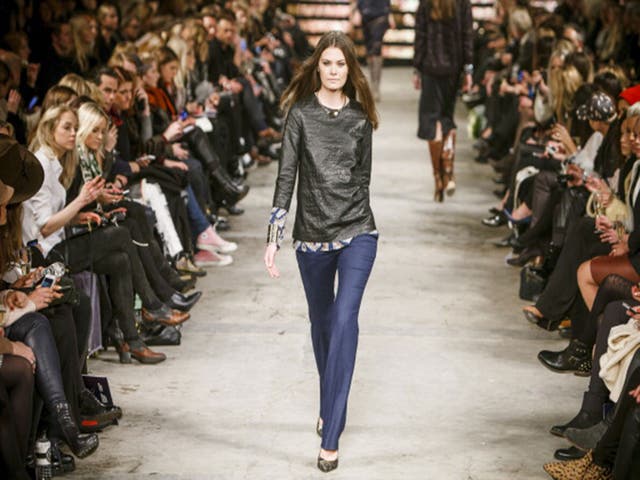 A model walks the runway at Copenhagen Fashion Week