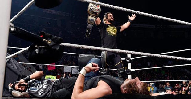 Seth Rollins shows off his WWE World Heavyweight Championship