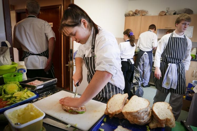 Catering students at Kendal College preparing food