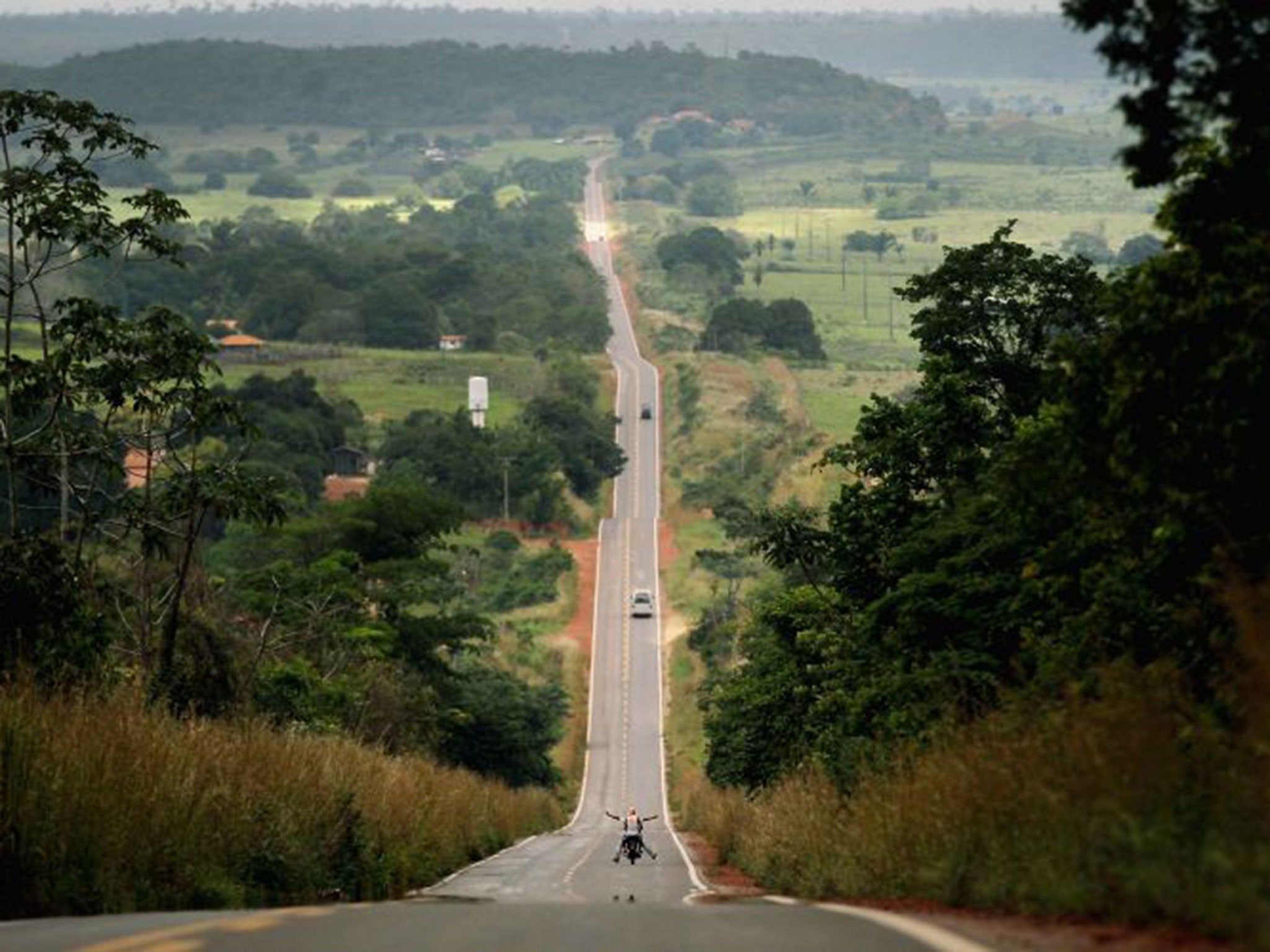 Para State drivers pass through deforested land along federal highway