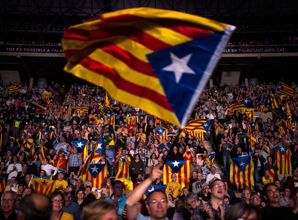 Catalan Pro-Independence supporters meet at a rally in Barcelona