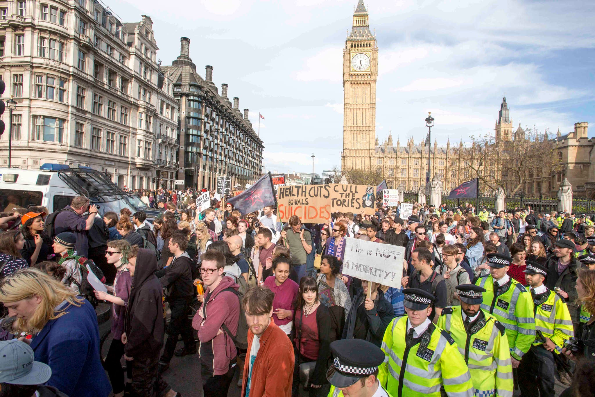 Police fight off anti-Tory protesters in Westminster two days after the election