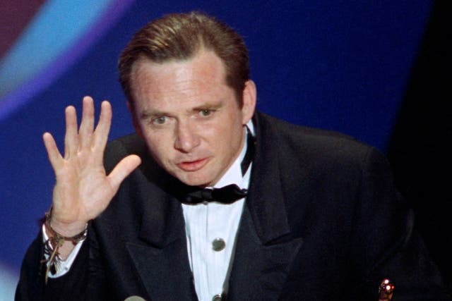 Michael Blake accepting the Oscar for best adapted screenplay for "Dances with Wolves" at the 63rd Annual Academy Awards in Los Angeles
