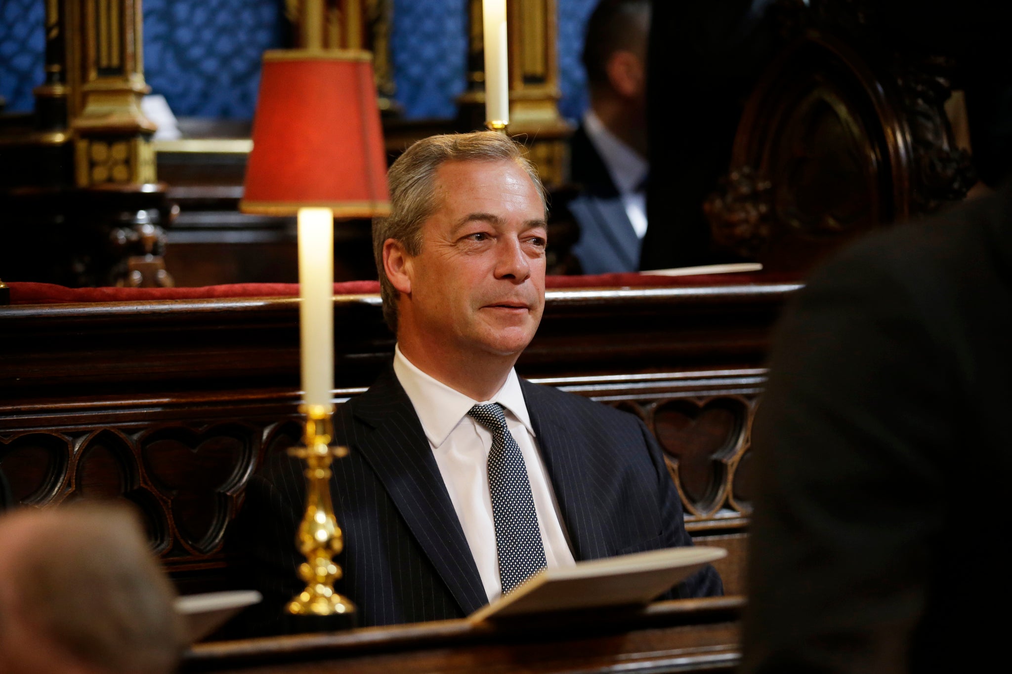 Nigel Farage waits for the start of the service of thanksgiving to mark the VE Day 70th Anniversary at Westminster Abbey on May 10