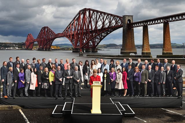 Nicola Sturgeon is joined by the SNP's newly elected MPs in front of the Forth Rail Bridge