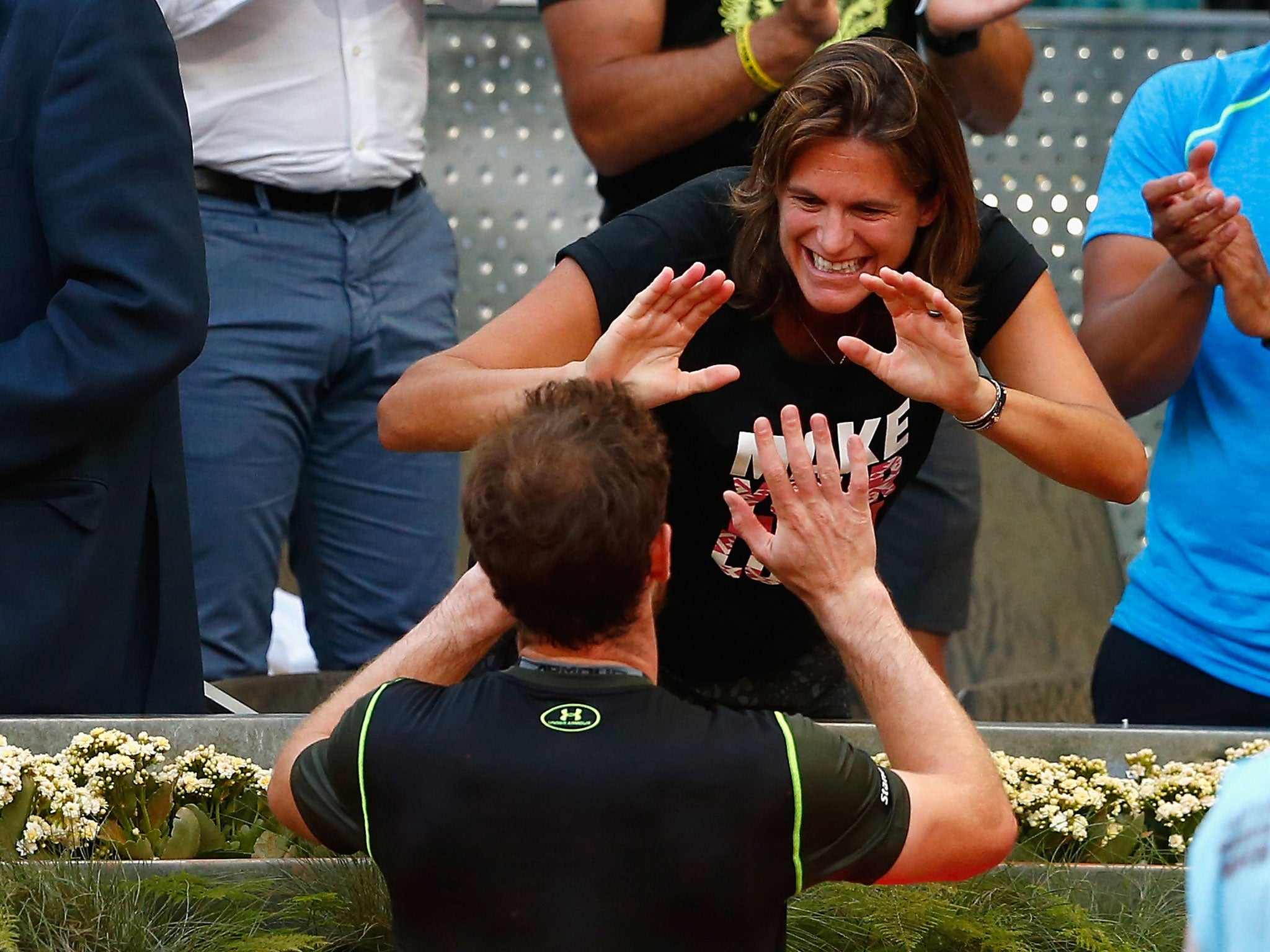 Andy Murray celebrates with coach Amelie Mauresmo after defeating Rafael Nadal