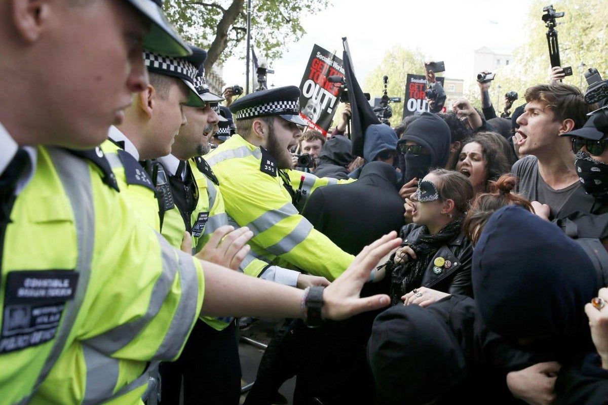 Anti-austerity protesters accuse police of 'violence' after 15 arrested ...