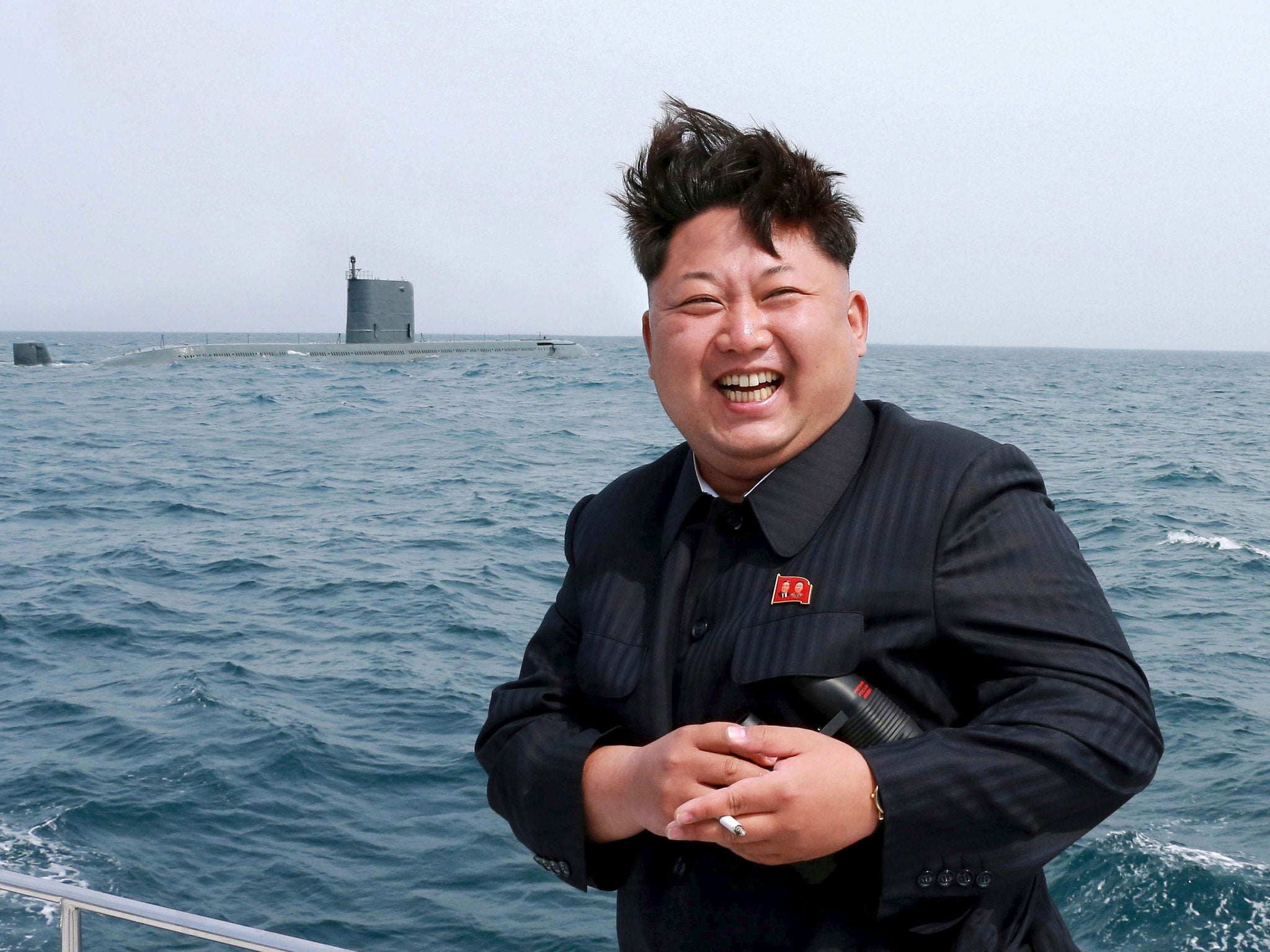 North Korean leader Kim Jong Un watches the test-fire of a strategic submarine underwater ballistic missile (not pictured)