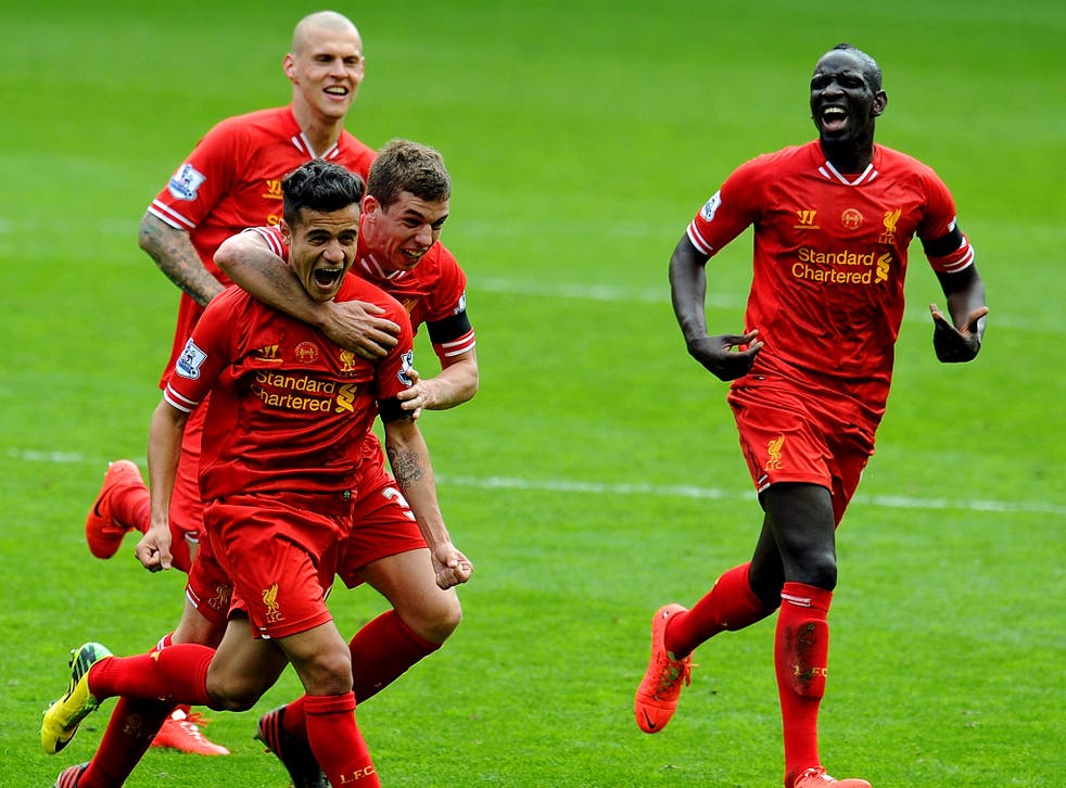 Liverpool celebrate Coutinho's winner against Manchester City