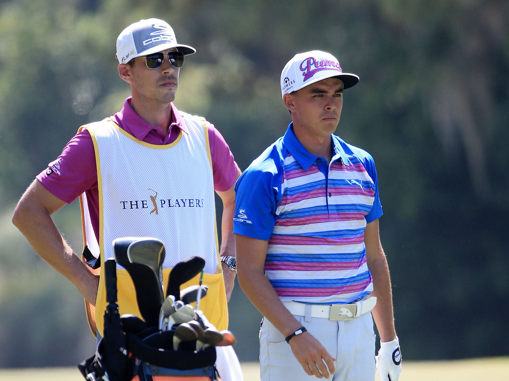 Fowler alongside his caddie Joseph Skovron