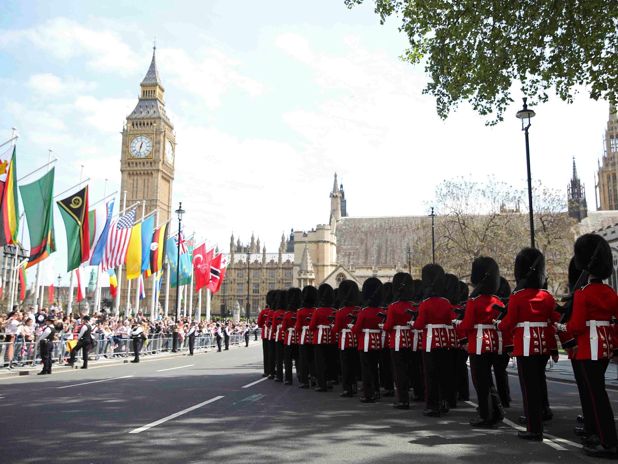 Guardsmen march during an armed forces and veterans' parade on the final day of 70th anniversary Victory in Europe (VE) day commemorations in central London