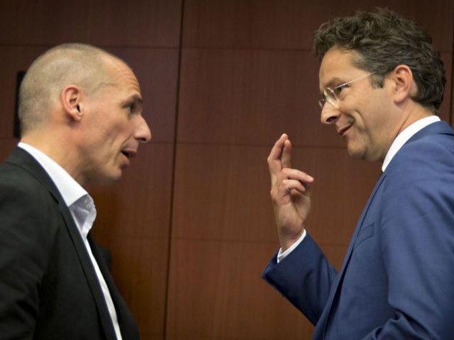 The Greek Finance minister Yanis Varoufakis (left) met with eurozone counterparts, including the Netherlands’ Jeroen Dijsselbloem (right) in Brussels as they tried to break an impasse in debt talks.