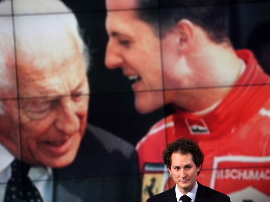John Elkann, pictured here in front of an image of his grandfather, Gianni Agnelli, runs the family’s Fiat empire