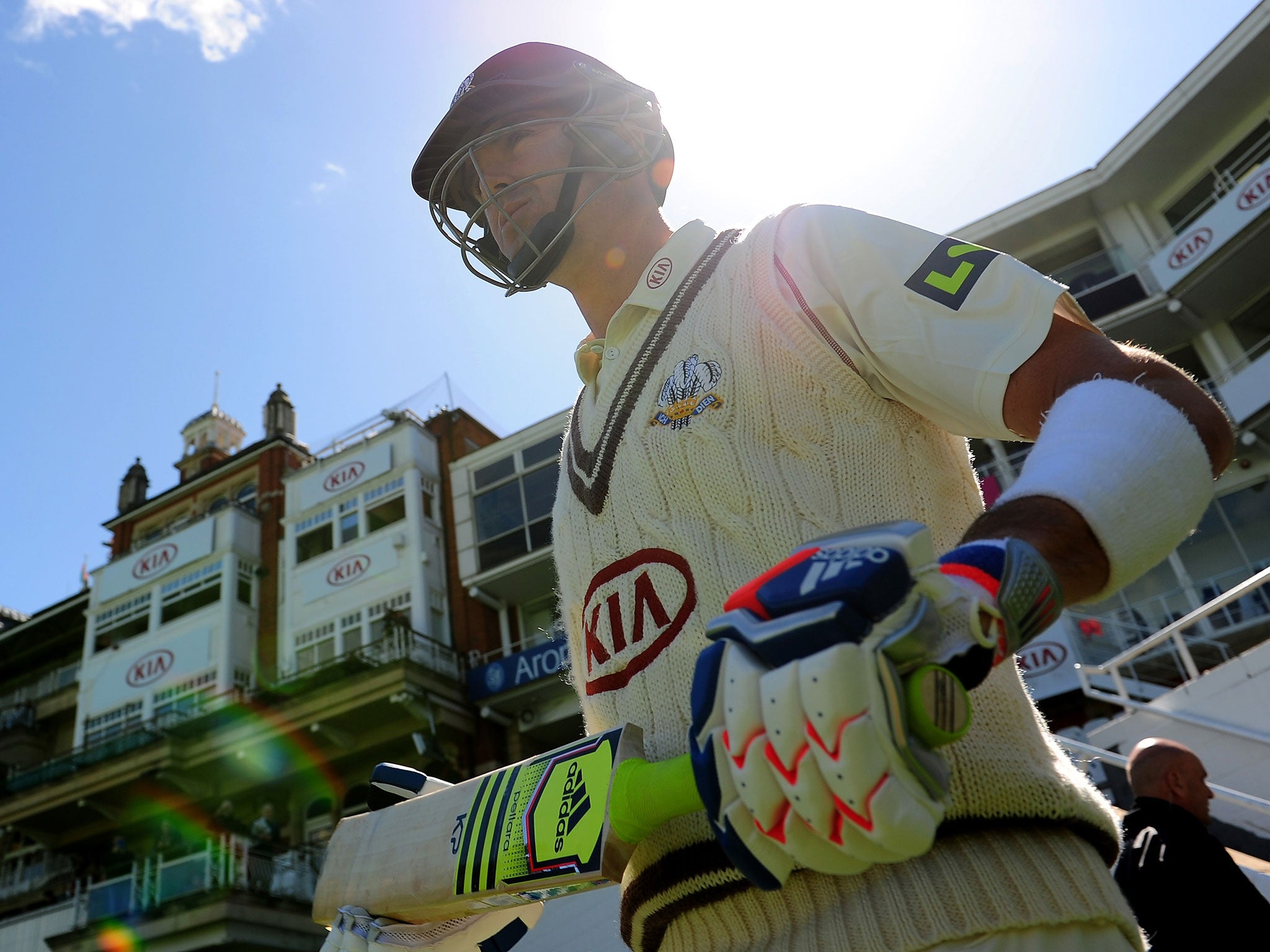 Kevin Pietersen makes his way out for Surrey during the match against Leicestershire