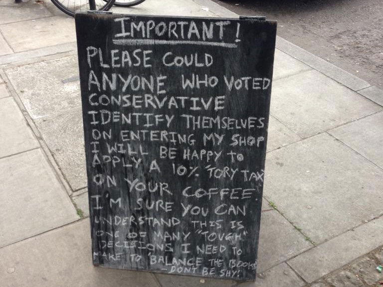 The blackboard for HER telling Tory voters to own up and pay a 10 per cent tax on their coffee in Hackney