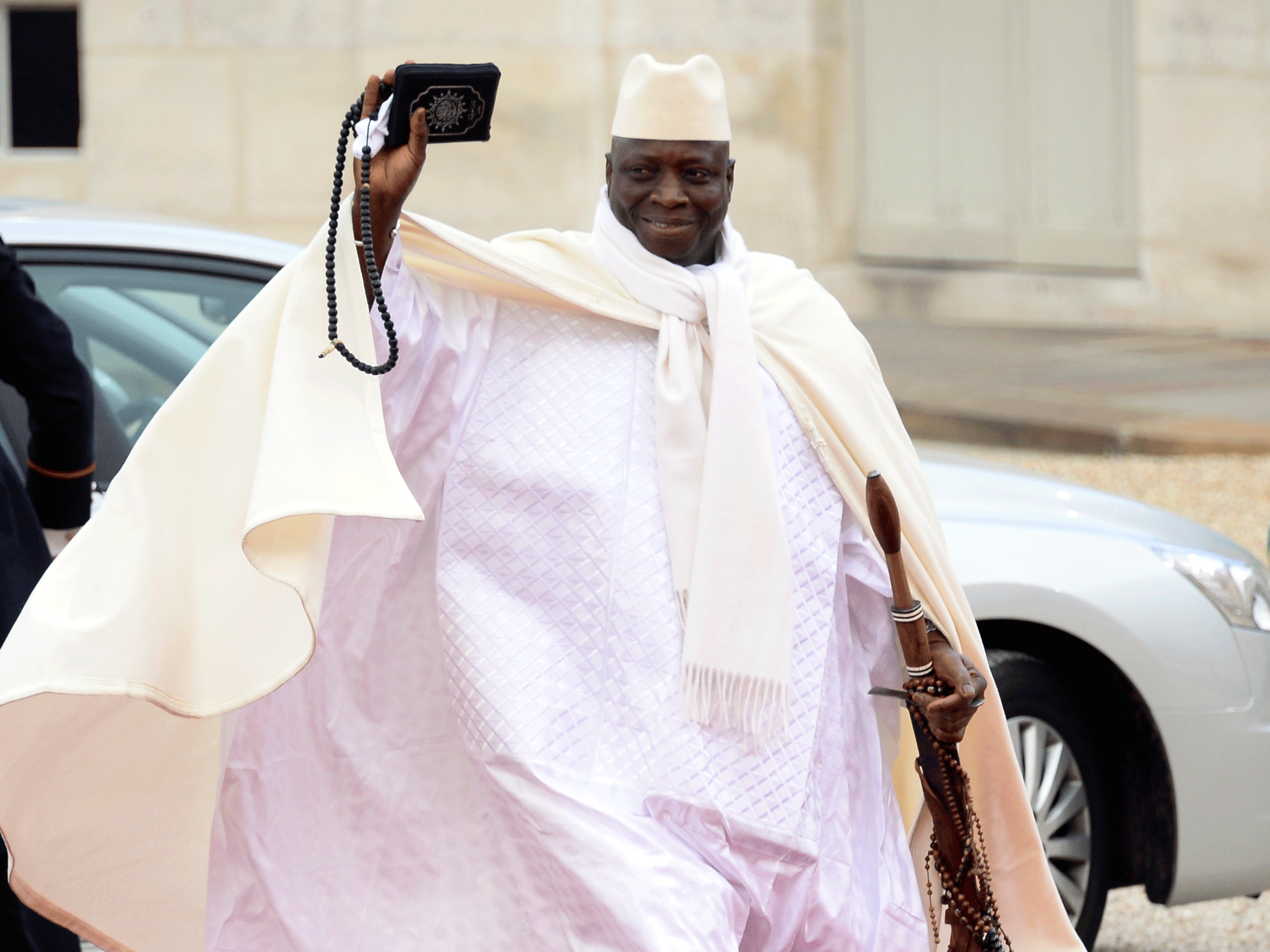 Gambia's President Yahya Jammeh arrives at the Elysee palace to participate in the Elysee summit for peace and safety in Africa, on December 6, 2013 in Paris. AFP PHOTO/ ALAIN JOCARD