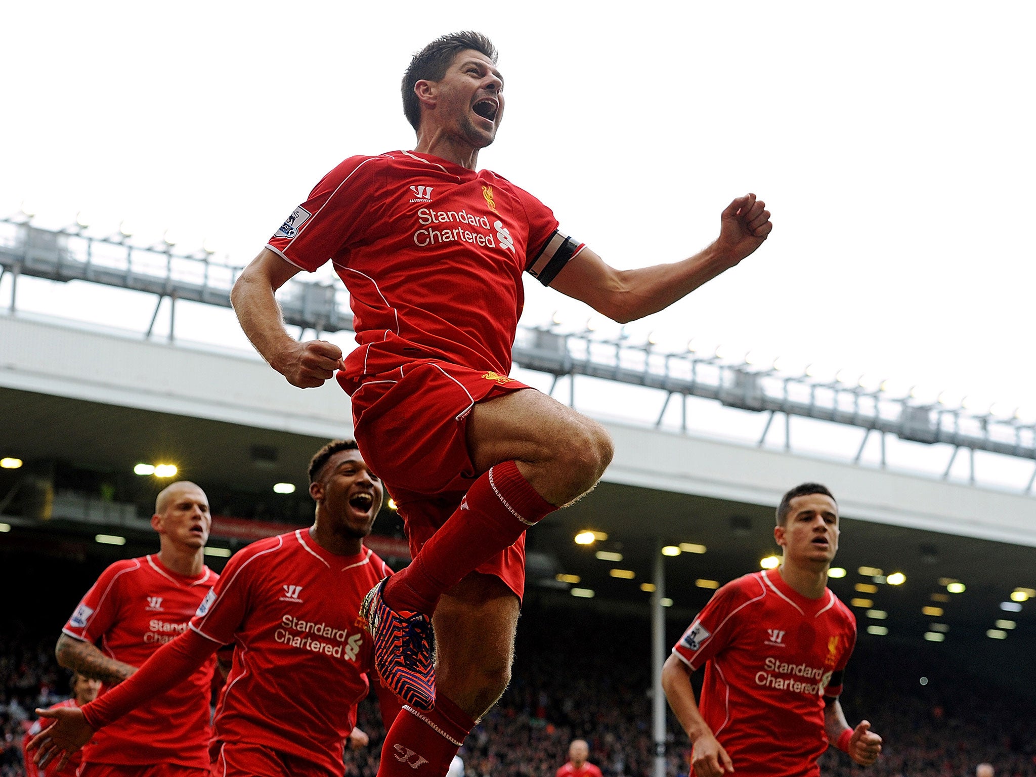 Steven Gerrard celebrates his goal against QPR at Anfield on 2 May