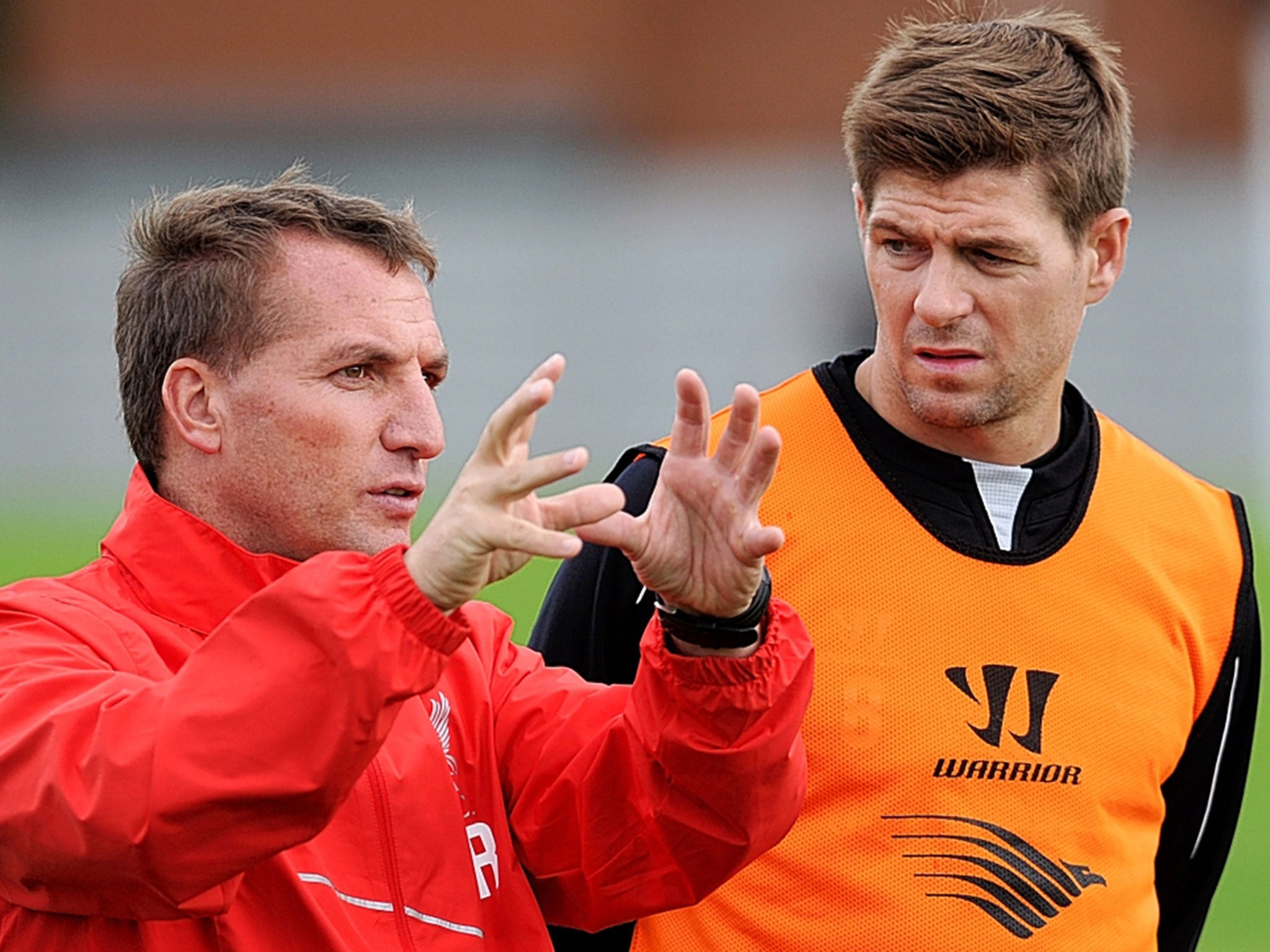 Liverpool manager Brendan Rodgers (left) told Steven Gerrard (right) he was not guaranteed a first-team start