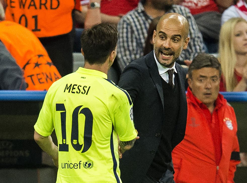 Lionel Messi shakes Pep Guardiola's hand as he leaves the pitch