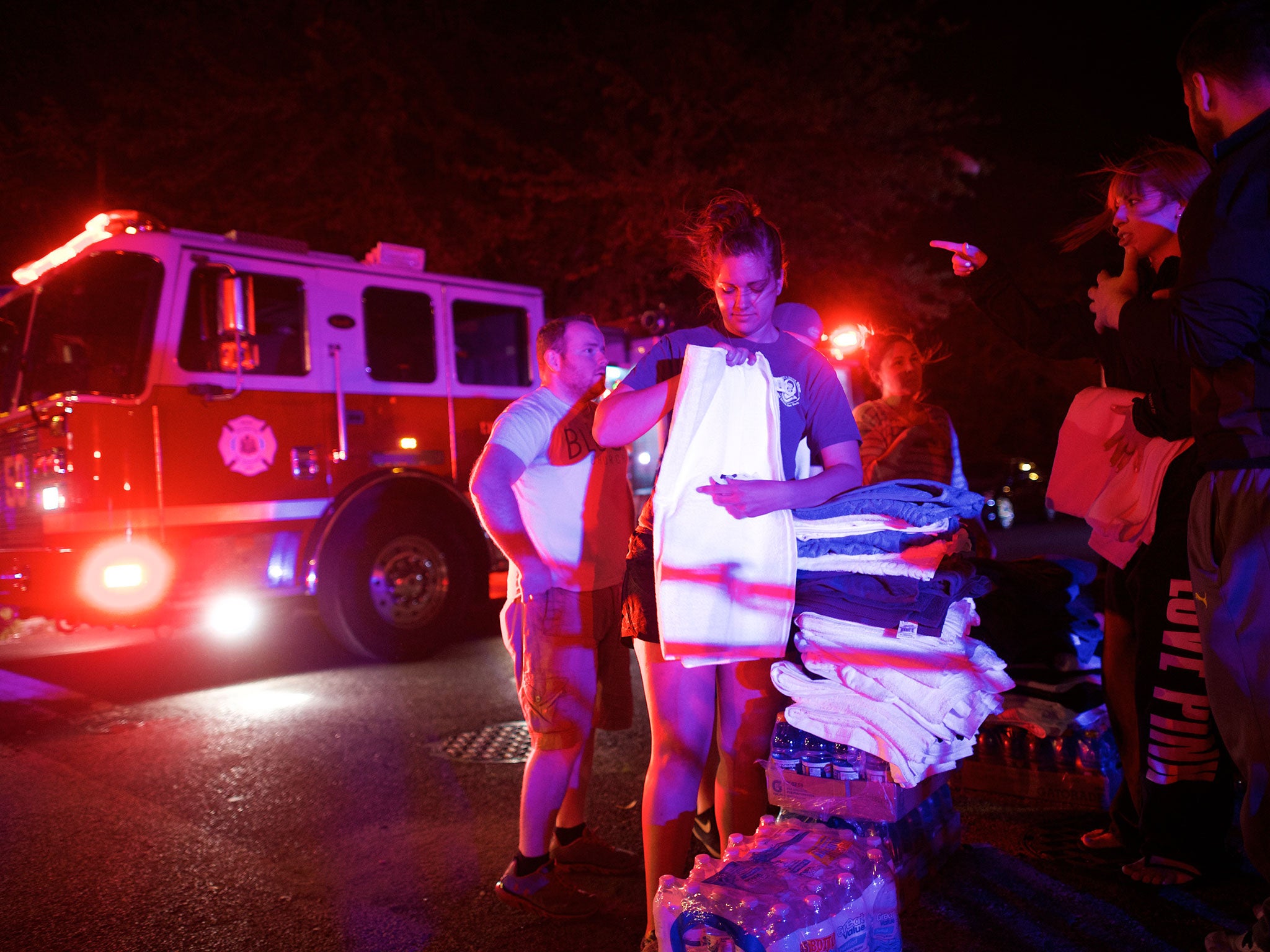 Members of the Block Church gather supplies to supply emergency personnel working at the wreckage of an Amtrak passenger train