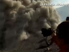 Telica volcano in Nicaragua erupts just metres in front of hiking group - video