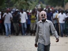 Burundi police use 'live ammunition and tear gas' against protesters