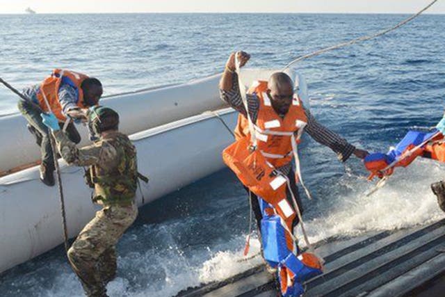 Royal Navy rescue migrants after receiving dstress call from Italian Coastguard