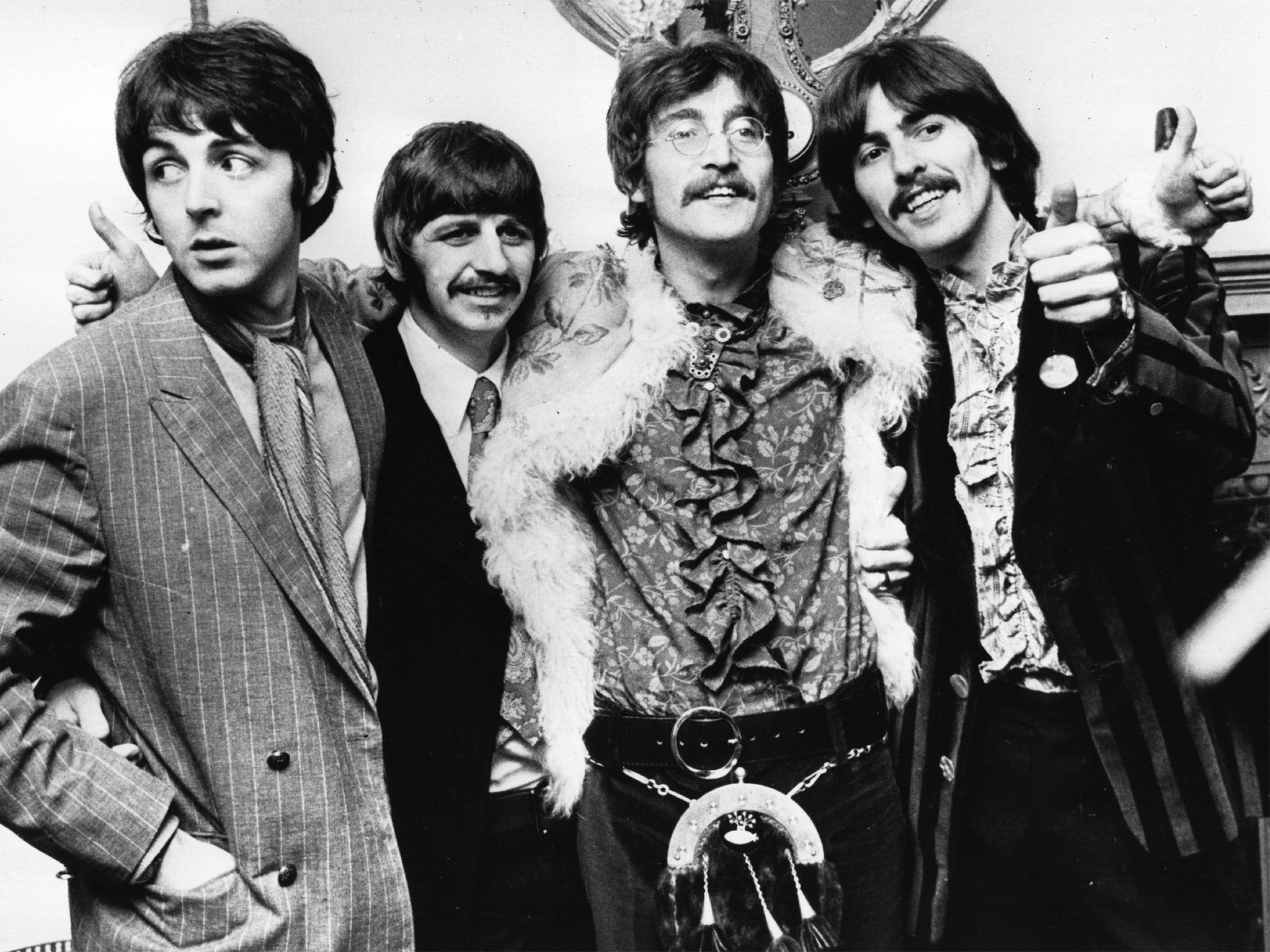 Paul McCartney (L) with The Beatles on 19 May 1967, just after recording ‘Sgt Pepper’