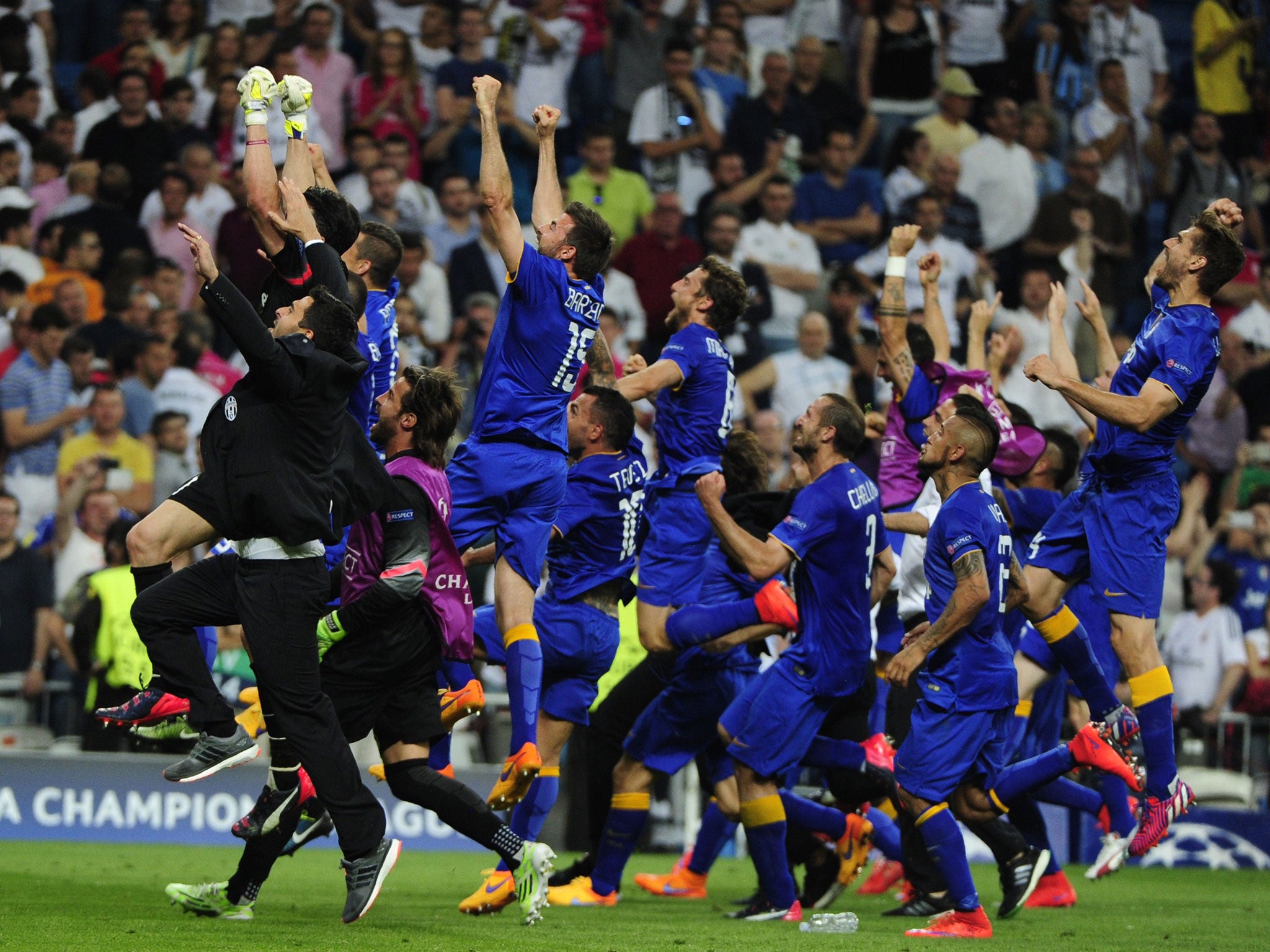 Juventus players celebrate the aggregate victory over Real Madrid