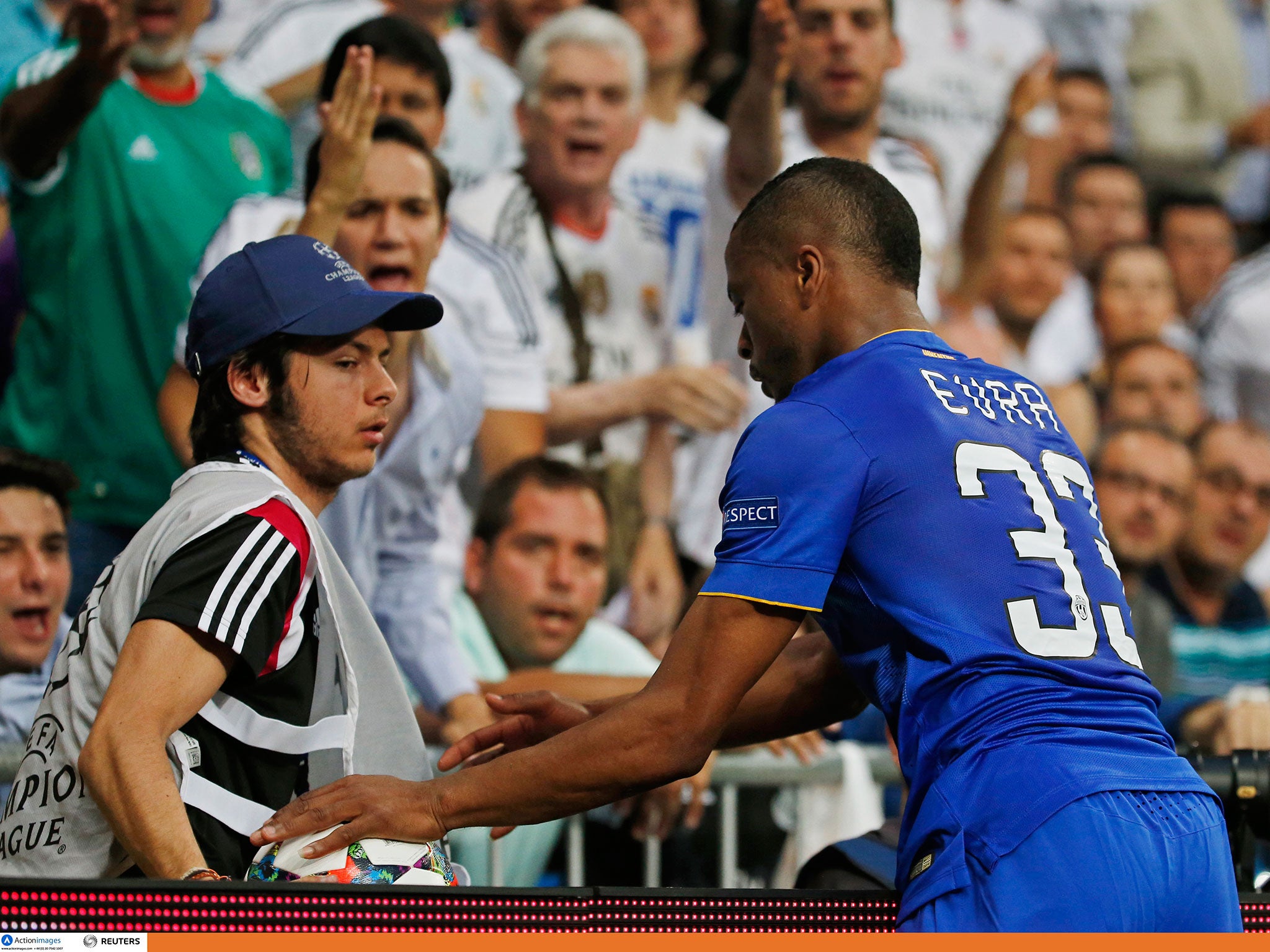 Patrice Evra attempts to retrieve the ball