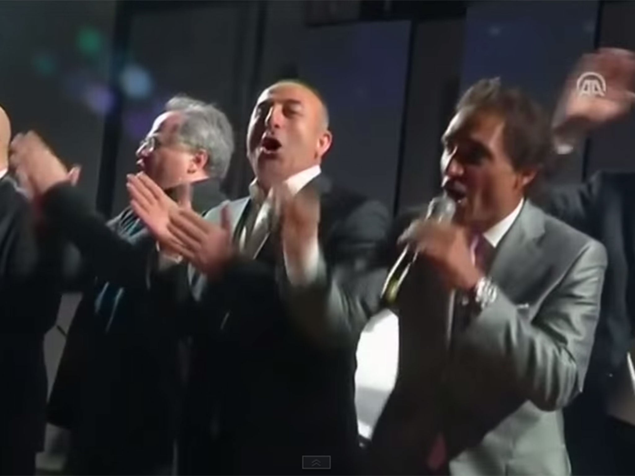 Dignitaries were invited up on stage at the Nato conference by the Turkish band