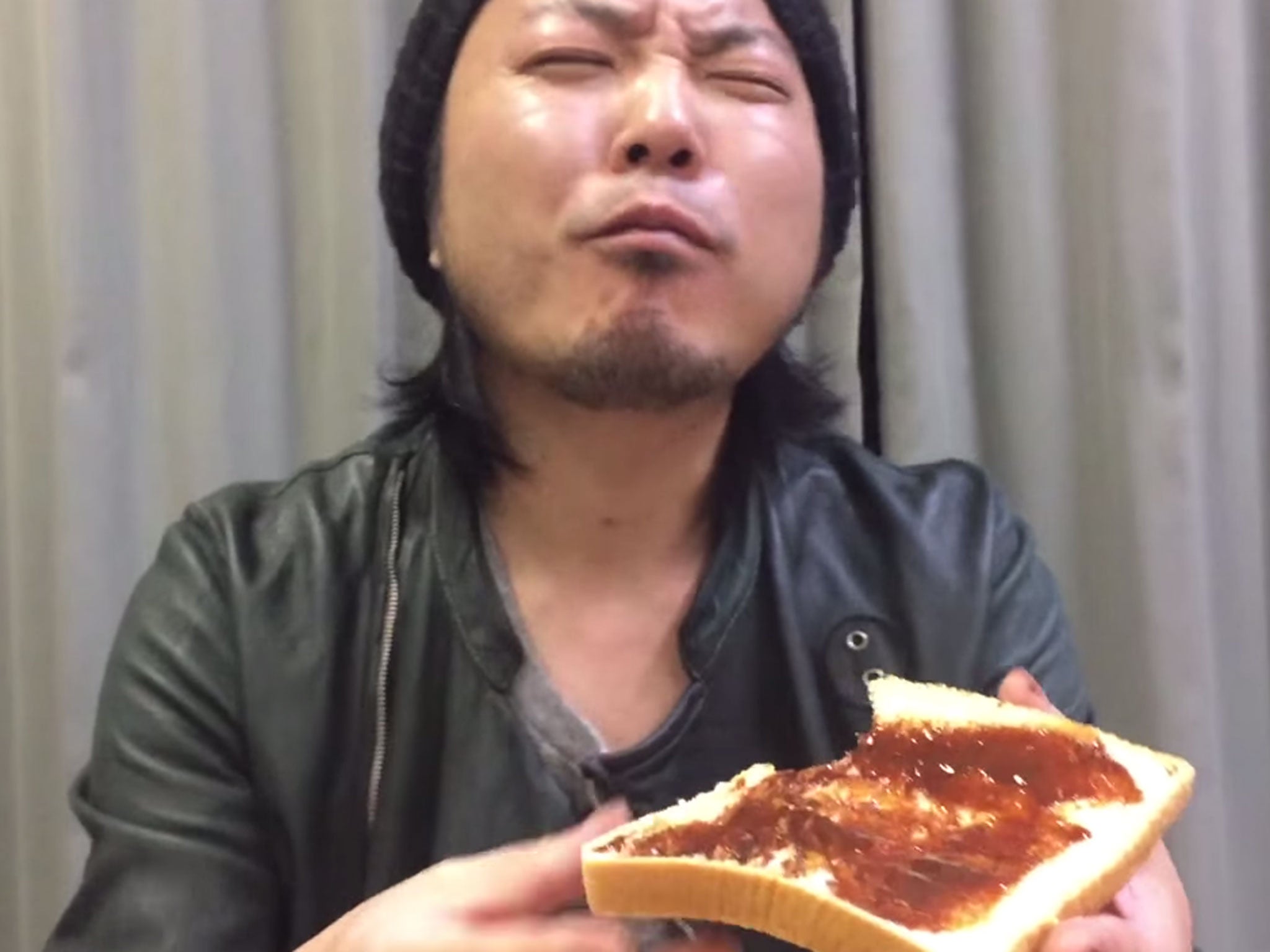 A Japanese man eats Marmite for the first time