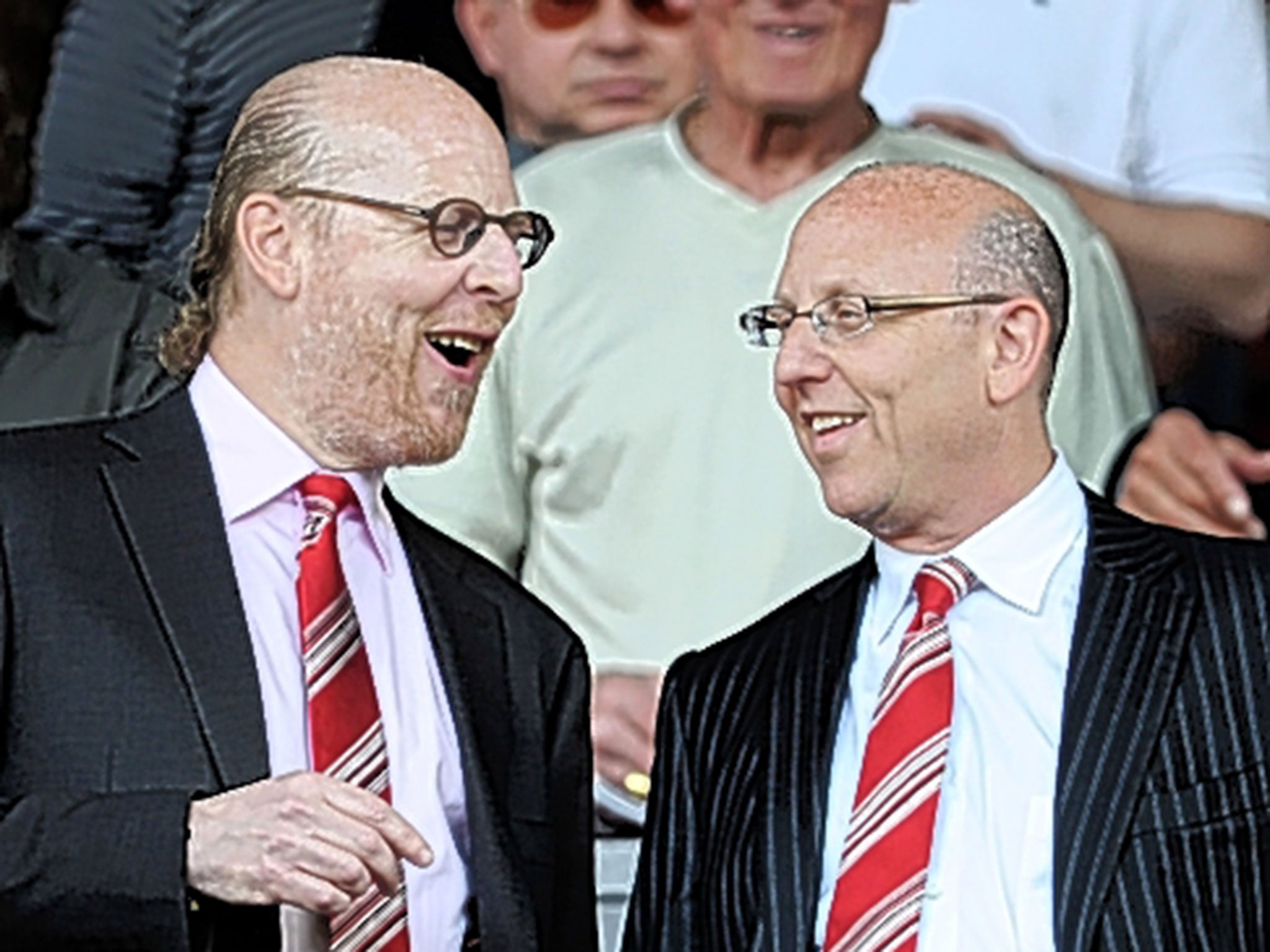 Brothers Joel (right) and Avram Glazer