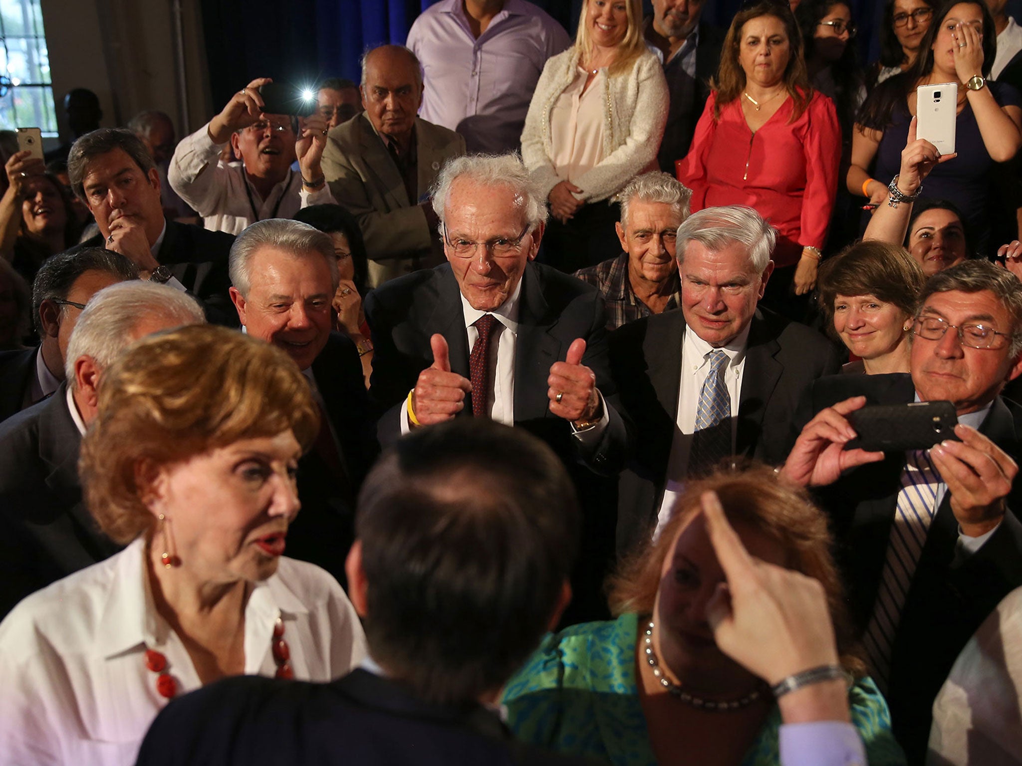 Norman Braman gives a thumbs-up to Rubio as he unveils his Republican presidential nomination