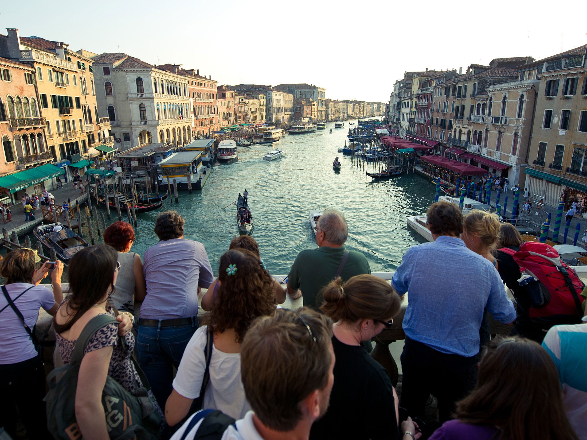 A bridge too far: increasing numbers of day-trippers are crowding Venice’s attractions such as the Rialto Bridge