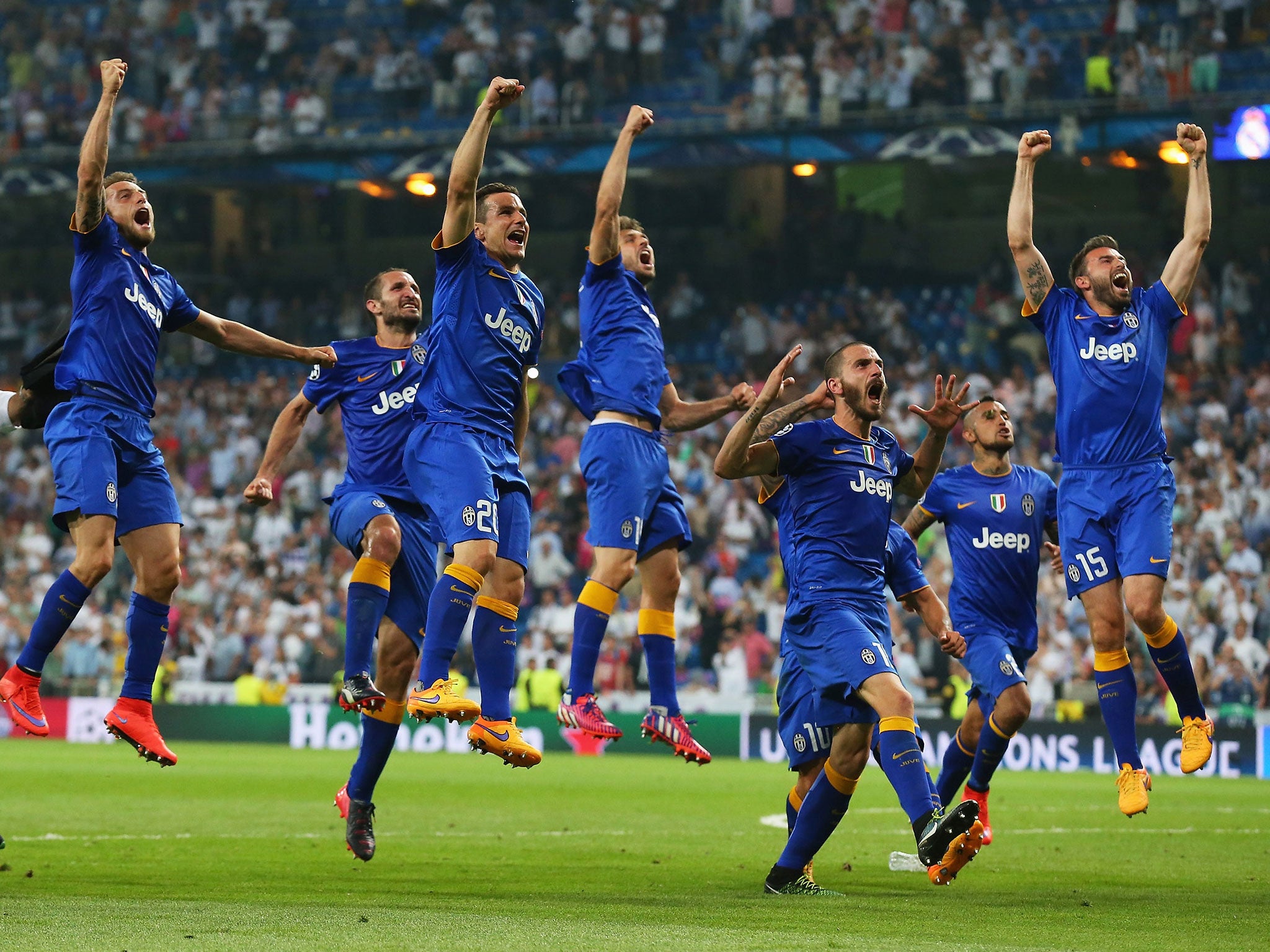 Juventus players celebrate their Champions League semi-final win over Real Madrid