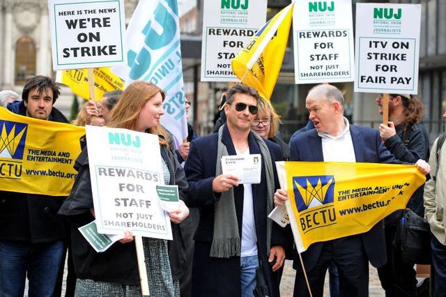A Simon Cowell lookalike joins the strike outside ITV