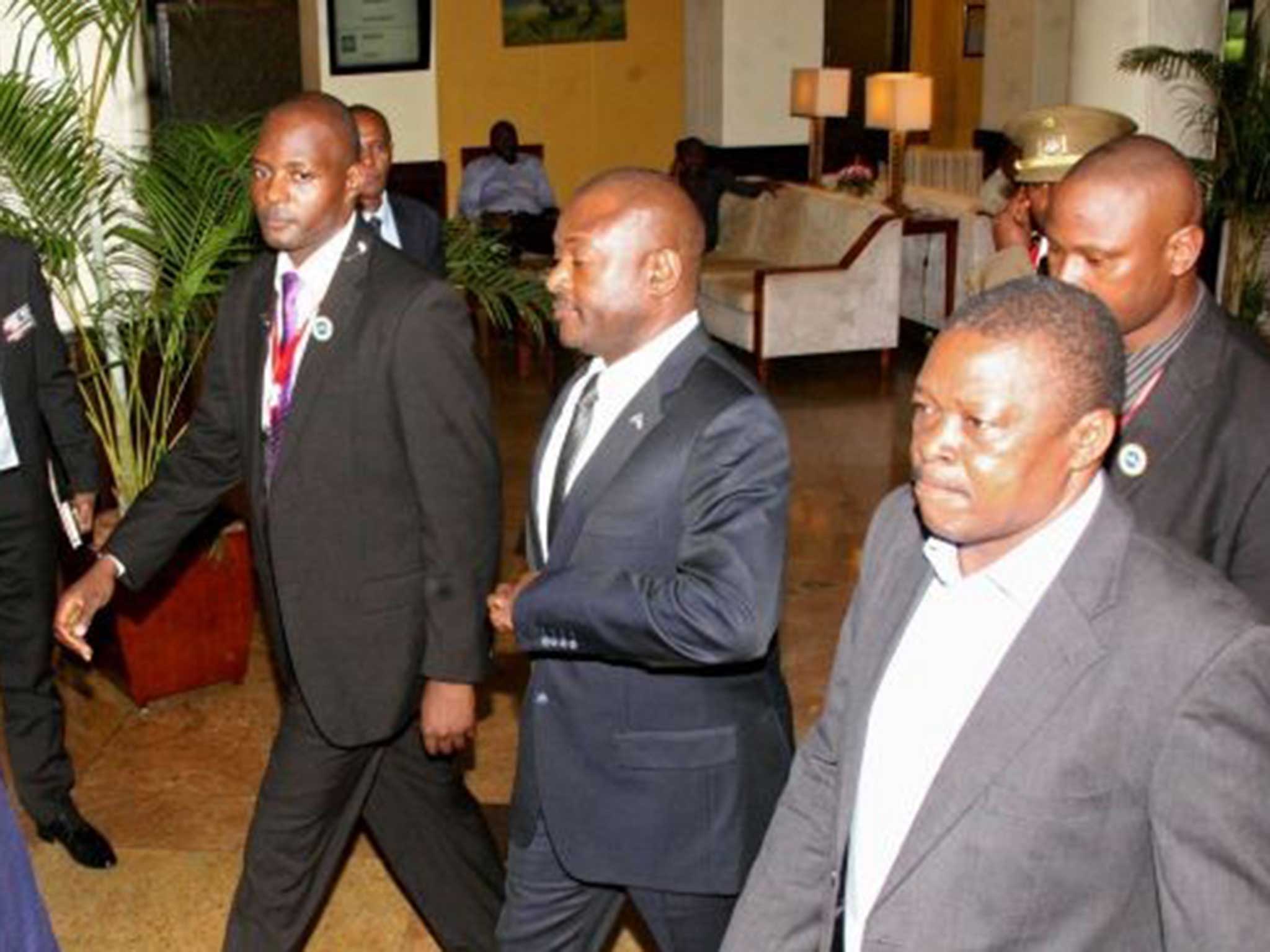 President Nkurunziza (centre) has now returned to Burundi